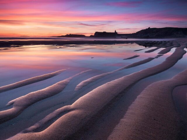 Puesta de sol en la playa de Foxos